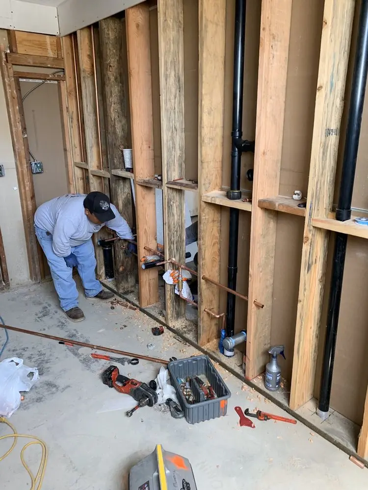 Commercial rough-in plumbing for Water Heater Replacement in Wood